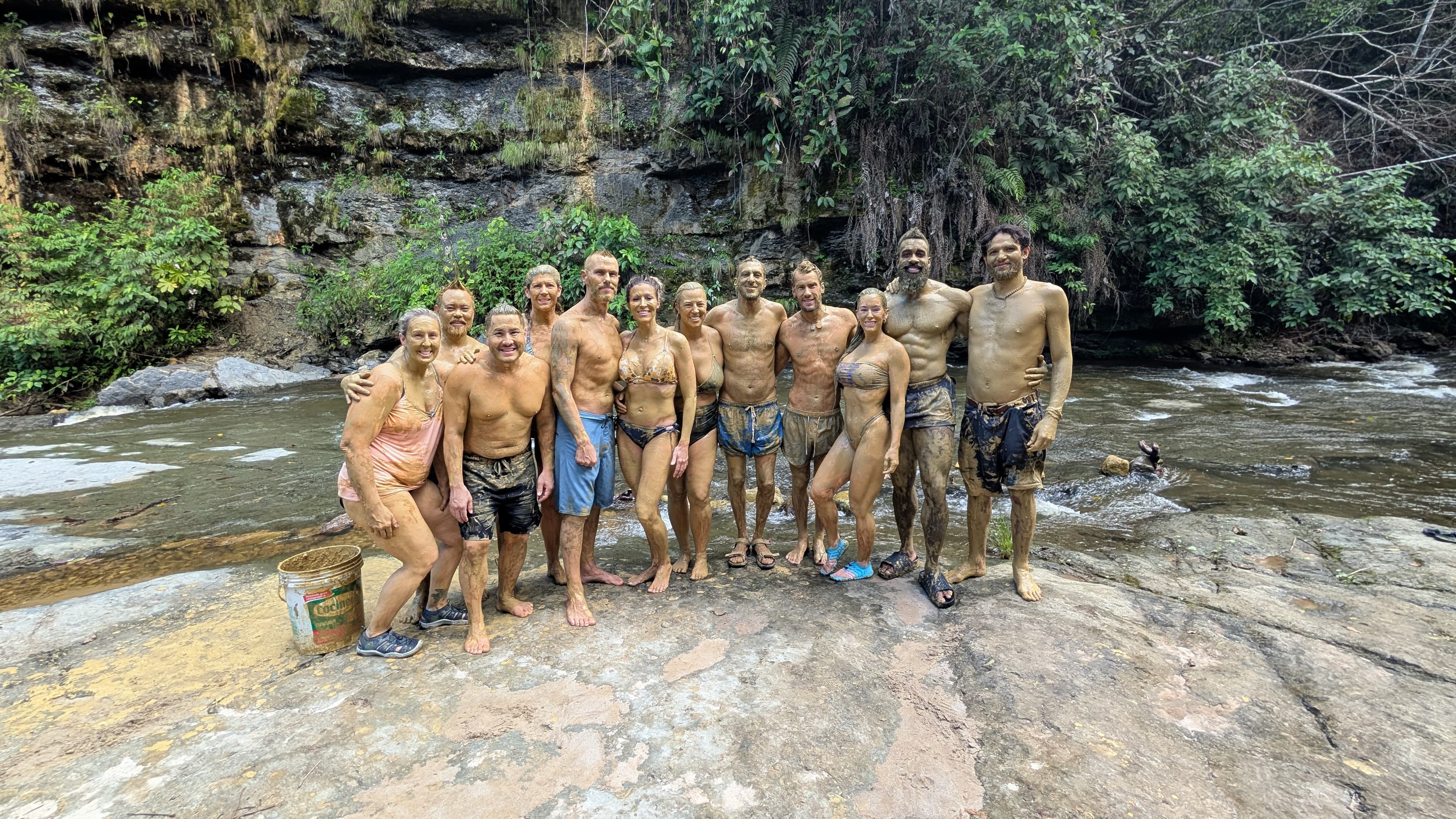 Group mud bath in the river